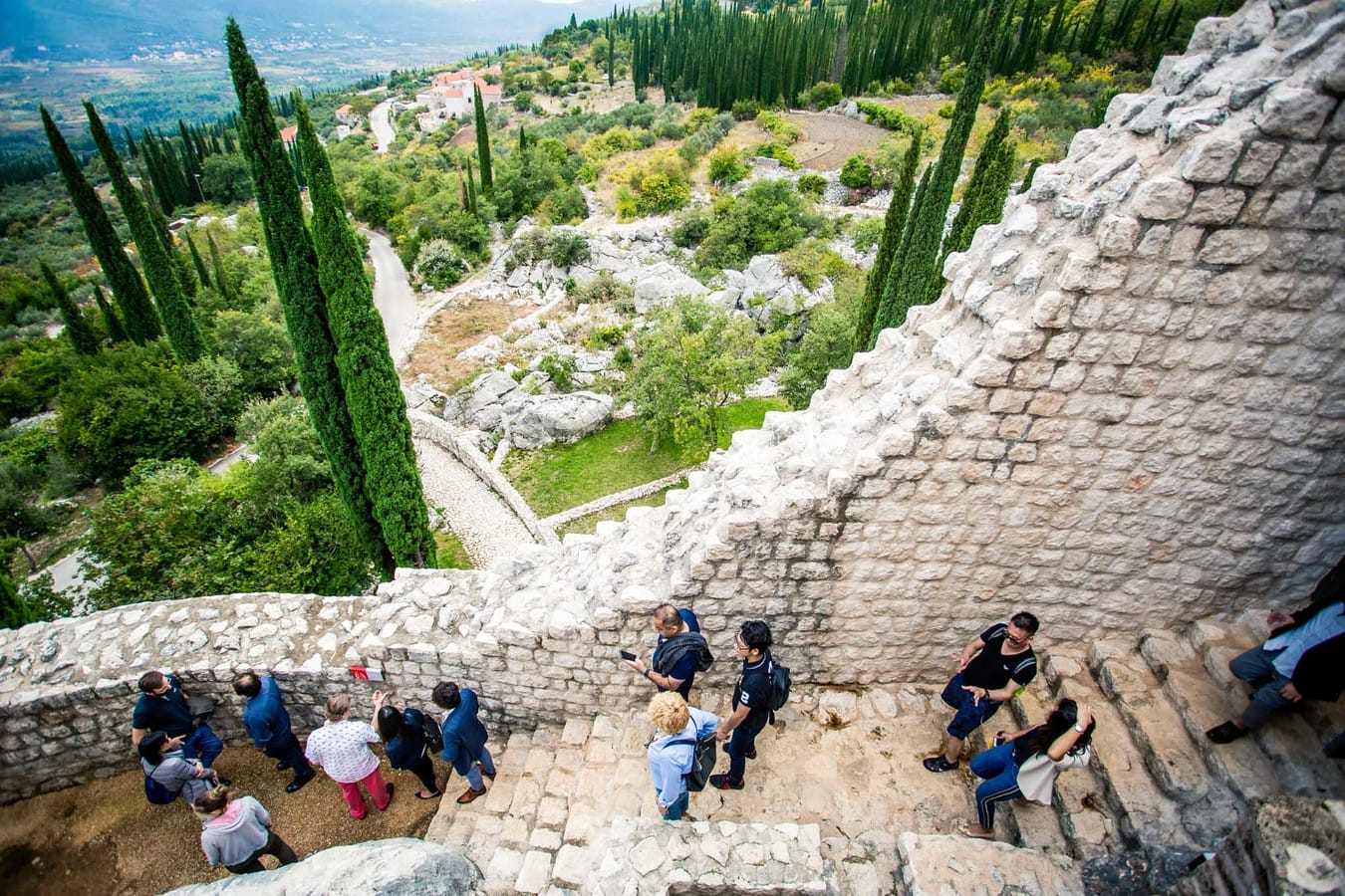 Konavle Wine Tour - People walking around and beautiful Konavle landscape in the background